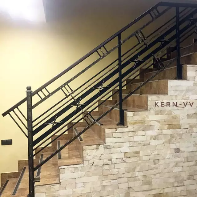 Stylish black interior wrougnt stair railing with horizontal bars and crosses. 97